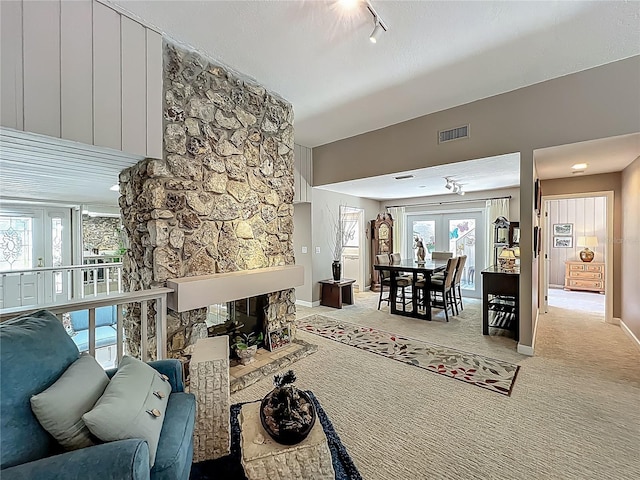 103 Red Cedar Dr, Longwood, FL 32779 - living room with french doors, track lighting, baseboards, and carpet floors
