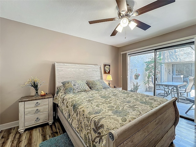 103 Red Cedar Dr, Longwood, FL 32779 - bedroom with access to exterior, dark wood-type flooring, baseboards, and a ceiling fan