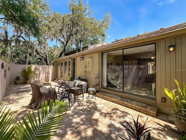 103 Red Cedar Dr, Longwood, FL 32779 - fenced backyard featuring a patio area and an outdoor hangout area