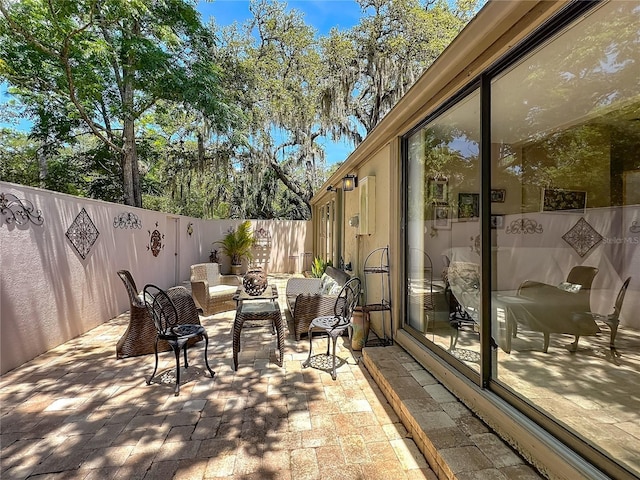 103 Red Cedar Dr, Longwood, FL 32779 - fenced backyard featuring a patio area and an outdoor living space