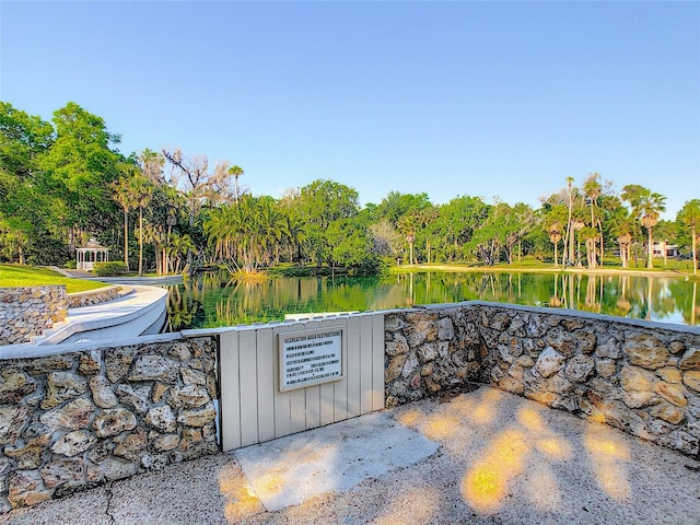 103 Red Cedar Dr, Longwood, FL 32779 - view of patio / terrace featuring a water view and view of wooded area