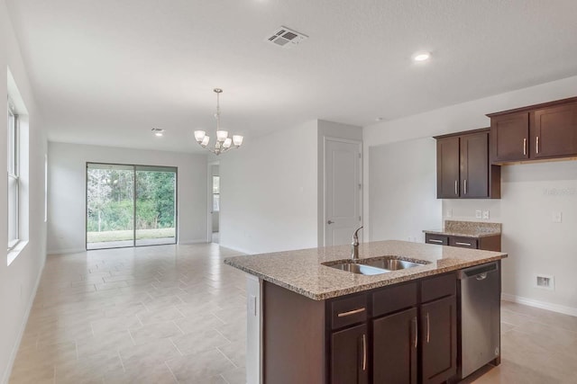 3975 Kennebunk Loop, Mount Dora, FL 32757 - kitchen featuring a sink, stainless steel dishwasher, light stone countertops, open floor plan, and a chandelier