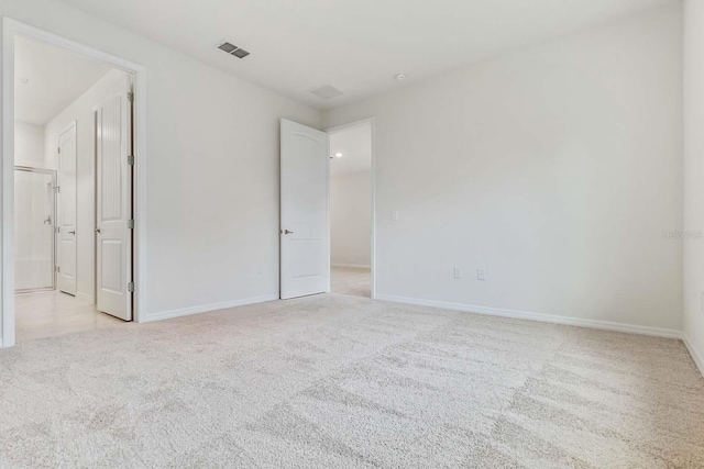 3975 Kennebunk Loop, Mount Dora, FL 32757 - unfurnished bedroom with carpet and baseboards