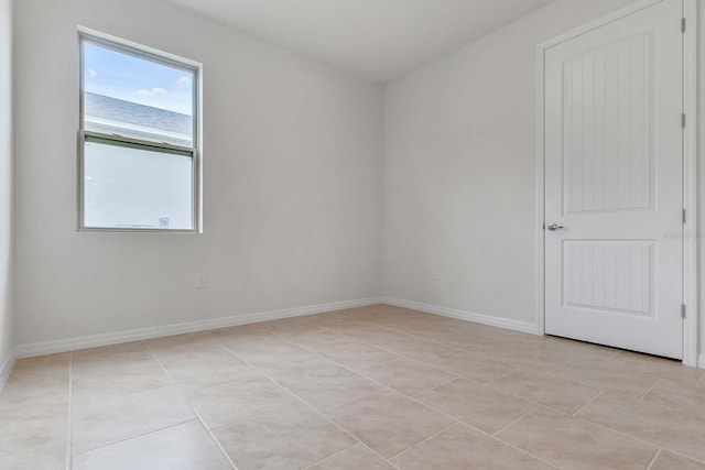 3975 Kennebunk Loop, Mount Dora, FL 32757 - unfurnished room with light tile patterned flooring and baseboards