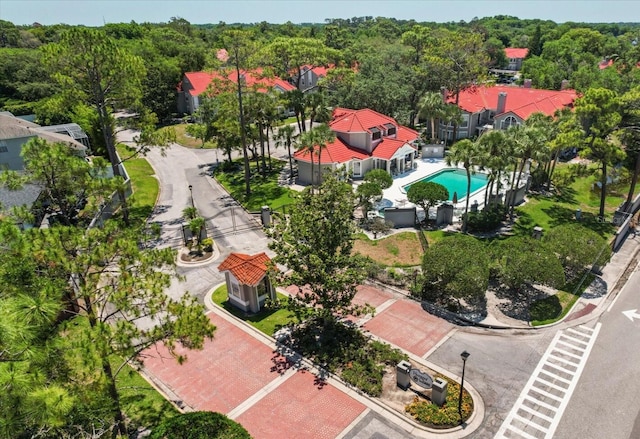 935 Northern Dancer Way Unit 107, Casselberry, FL 32707 - aerial view of a pool and a heavily wooded area