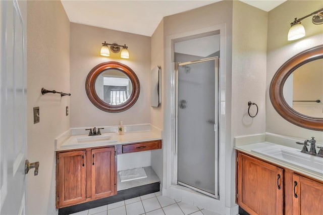 935 Northern Dancer Way Unit 107, Casselberry, FL 32707 - full bath with a stall shower, tile patterned floors, and two vanities