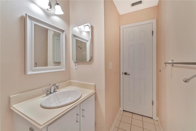 935 Northern Dancer Way Unit 107, Casselberry, FL 32707 - bathroom featuring baseboards, tile patterned flooring, and vanity