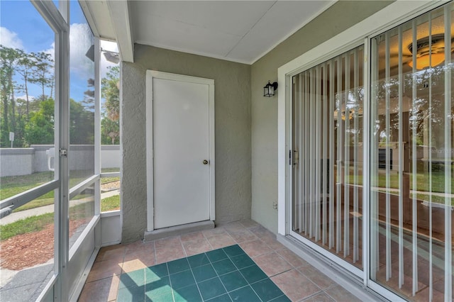935 Northern Dancer Way Unit 107, Casselberry, FL 32707 - unfurnished sunroom featuring healthy amount of natural light