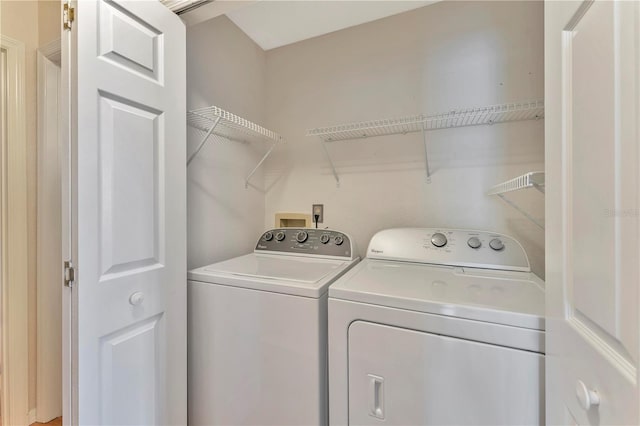935 Northern Dancer Way Unit 107, Casselberry, FL 32707 - laundry area featuring independent washer and dryer