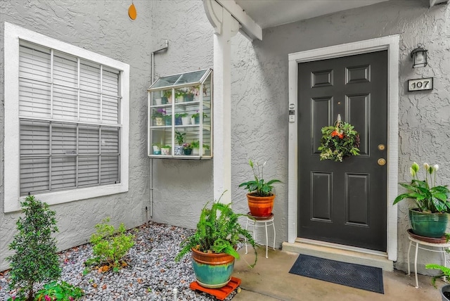 935 Northern Dancer Way Unit 107, Casselberry, FL 32707 - entrance to property with stucco siding