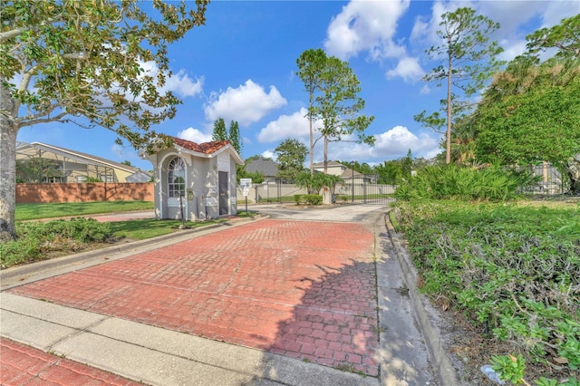 935 Northern Dancer Way Unit 107, Casselberry, FL 32707 - view of community featuring a residential view and a gate