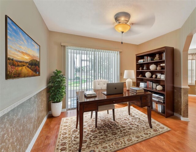 935 Northern Dancer Way Unit 107, Casselberry, FL 32707 - home office with light wood-style floors, baseboards, and ceiling fan