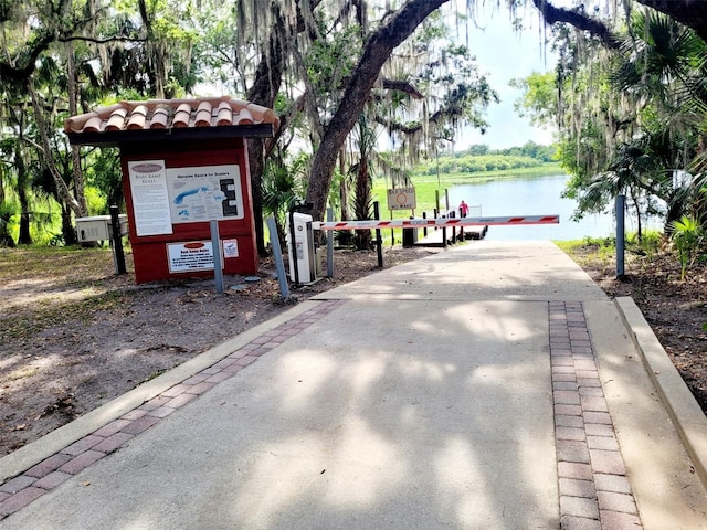 850 Lazio Cir, Debary, FL 32713 - view of home's community with a water view and a dock