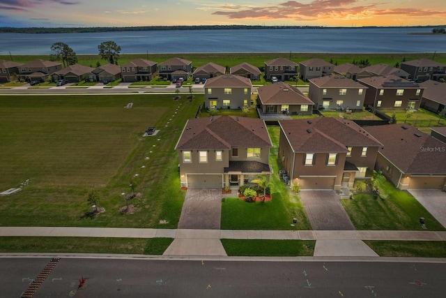 850 Lazio Cir, Debary, FL 32713 - aerial view at dusk of a residential view and a water view