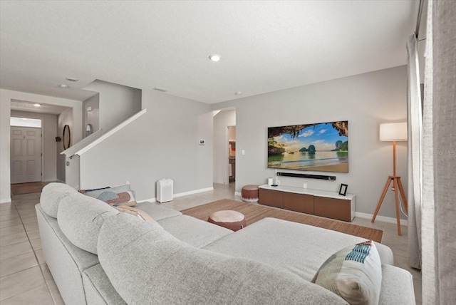 850 Lazio Cir, Debary, FL 32713 - living room with light tile patterned floors, baseboards, and recessed lighting