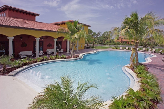 850 Lazio Cir, Debary, FL 32713 - community pool with a patio area and a ceiling fan