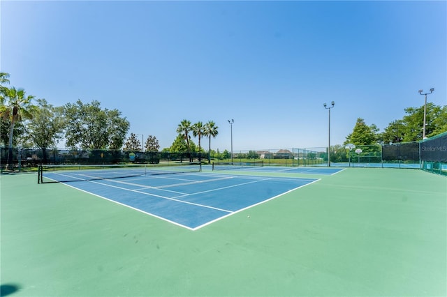 1902 Hailsham Ct, Orlando, FL 32824 - view of tennis court with fence and community basketball court