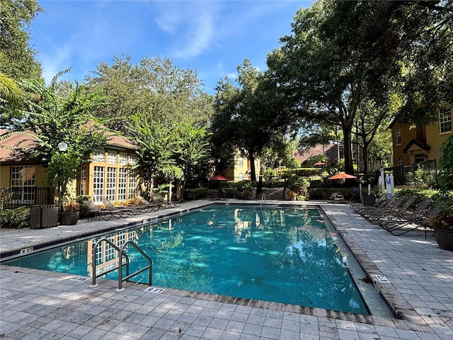 community pool featuring a patio