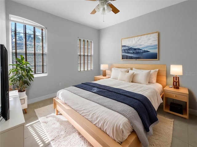 84 Camino Real Blvd, Howey In The Hills, FL 34737 - bedroom featuring baseboards, tile patterned floors, and ceiling fan