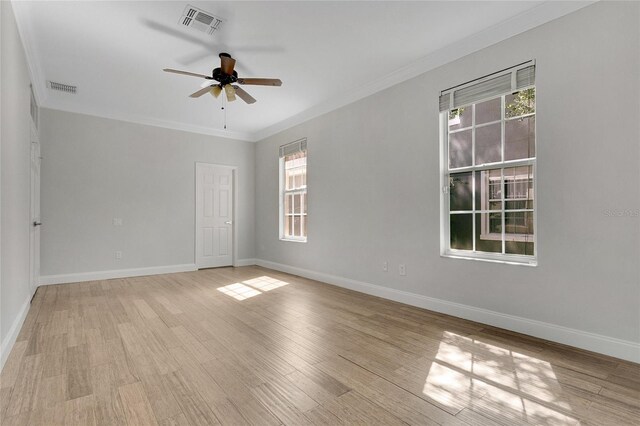 7900 Saint Giles Pl, Orlando, FL 32835 - spare room featuring ceiling fan, baseboards, ornamental molding, and light wood finished floors