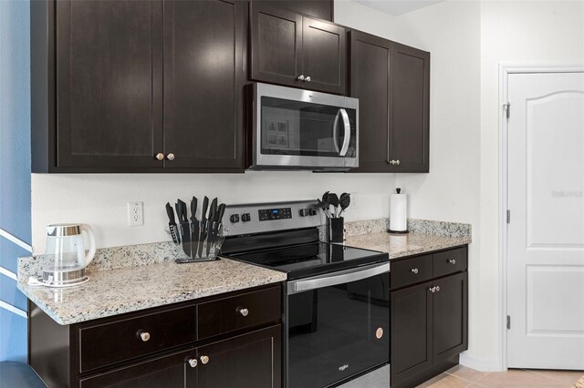 616 Griffon Ave, Lake Alfred, FL 33850 - kitchen featuring stainless steel appliances and light stone countertops