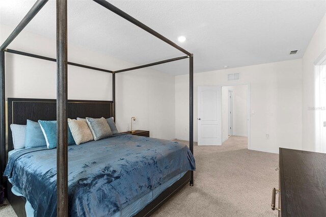 616 Griffon Ave, Lake Alfred, FL 33850 - bedroom with light carpet, baseboards, and recessed lighting