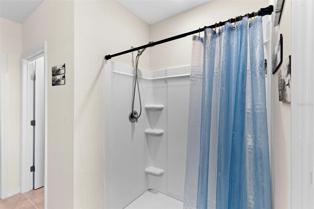 616 Griffon Ave, Lake Alfred, FL 33850 - bathroom featuring a stall shower and tile patterned floors