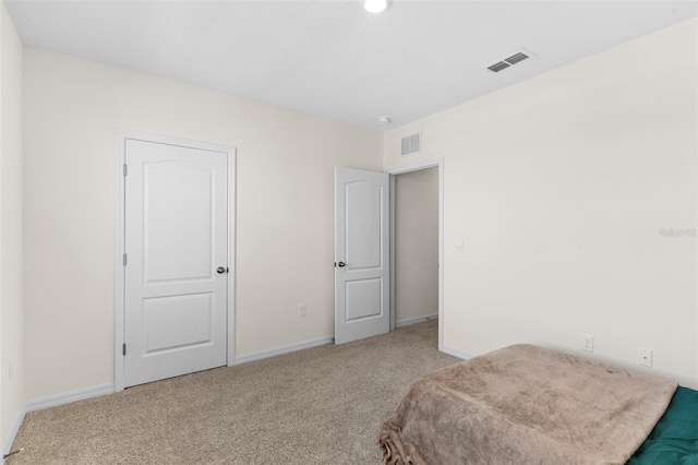 616 Griffon Ave, Lake Alfred, FL 33850 - unfurnished bedroom with carpet floors and baseboards