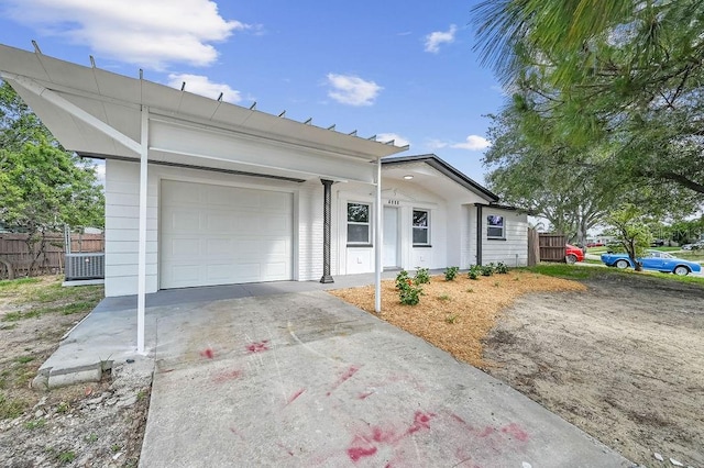 4119 Beacon Square Dr, Holiday, FL 34691 - single story home with a garage and concrete driveway