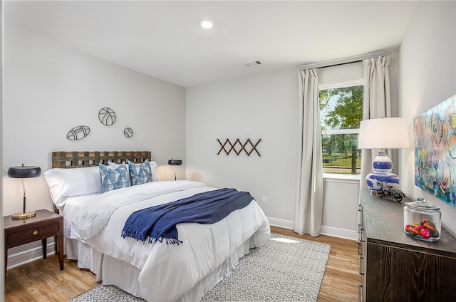 5 Heuchera Ct E, Homosassa, FL 34446 - bedroom featuring light wood-style flooring, baseboards, and recessed lighting