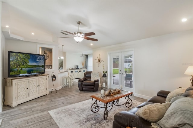 2113 Kirkland Lake Dr, Auburndale, FL 33823 - living area with light wood-style floors, a ceiling fan, french doors, baseboards, and recessed lighting