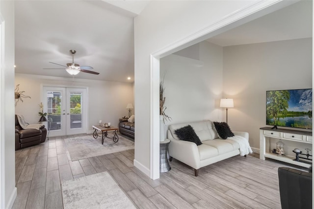 2113 Kirkland Lake Dr, Auburndale, FL 33823 - living area featuring wood finished floors, french doors, ceiling fan, and baseboards