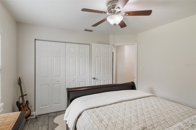 2113 Kirkland Lake Dr, Auburndale, FL 33823 - bedroom featuring wood finished floors, a closet, and ceiling fan