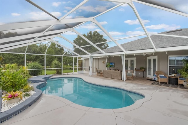 2113 Kirkland Lake Dr, Auburndale, FL 33823 - outdoor pool with french doors, outdoor lounge area, a patio area, and an in-ground hot tub