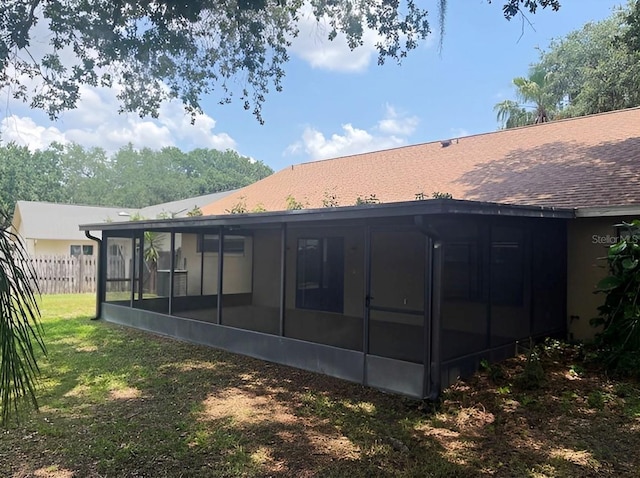 1606 Red Clover Ct, Orlando, FL 32825 - back of house with a sunroom