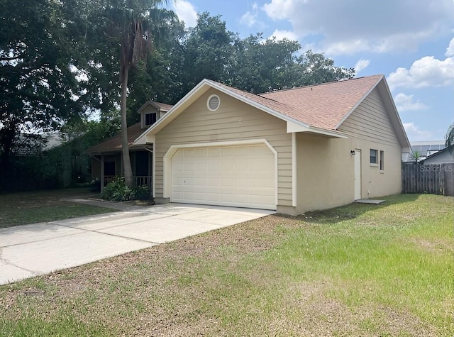 1606 Red Clover Ct, Orlando, FL 32825 - view of front of house with a garage and driveway