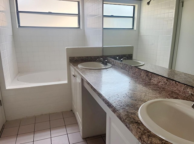 1606 Red Clover Ct, Orlando, FL 32825 - full bathroom featuring tiled tub, double vanity, tile patterned floors, and a tile shower