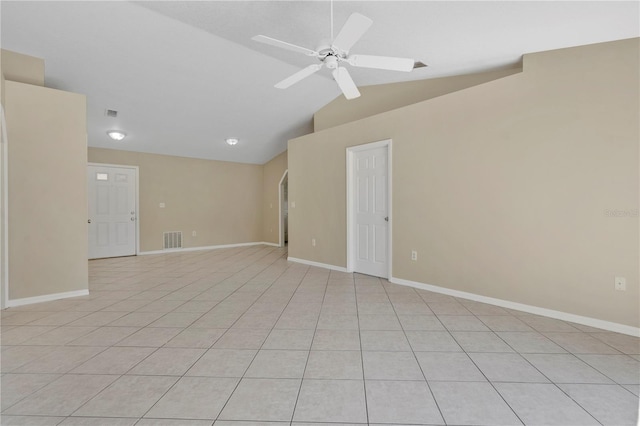 1614 Christa Ct, Saint Cloud, FL 34772 - spare room featuring vaulted ceiling, ceiling fan, baseboards, and light tile patterned floors