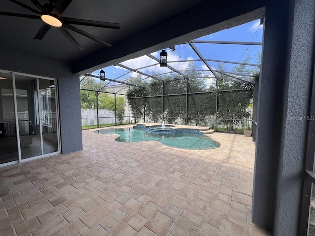 14936 Masthead Landing Cir, Winter Garden, FL 34787 - view of pool with a ceiling fan, a pool with connected hot tub, a patio, and glass enclosure