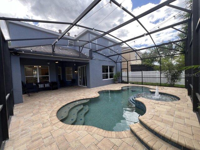 14936 Masthead Landing Cir, Winter Garden, FL 34787 - view of pool featuring a patio and glass enclosure