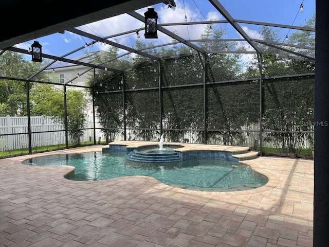 14936 Masthead Landing Cir, Winter Garden, FL 34787 - view of pool featuring a patio area, a hot tub, and glass enclosure