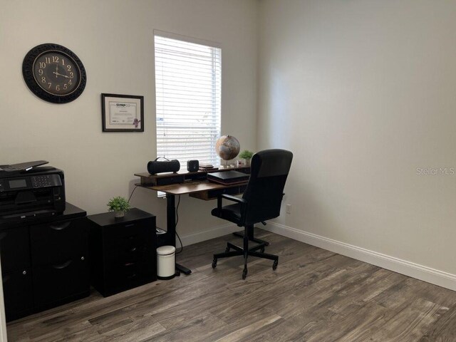 14936 Masthead Landing Cir, Winter Garden, FL 34787 - office with wood finished floors and baseboards