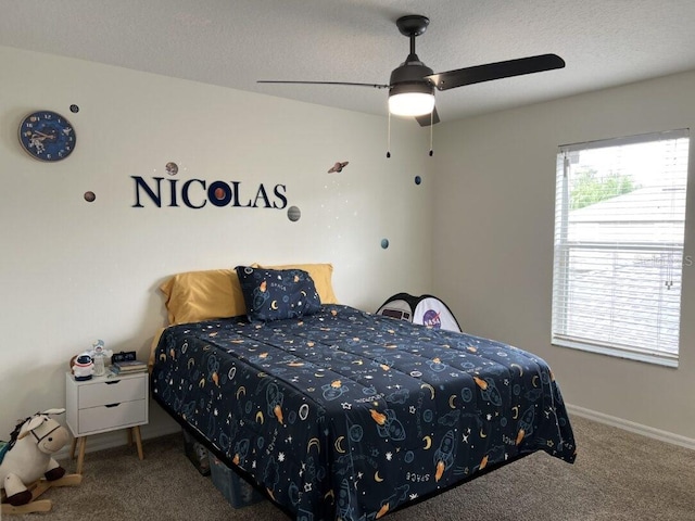 14936 Masthead Landing Cir, Winter Garden, FL 34787 - bedroom featuring carpet, a textured ceiling, and ceiling fan