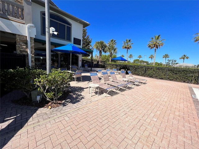 14936 Masthead Landing Cir, Winter Garden, FL 34787 - view of patio / terrace with outdoor dining space