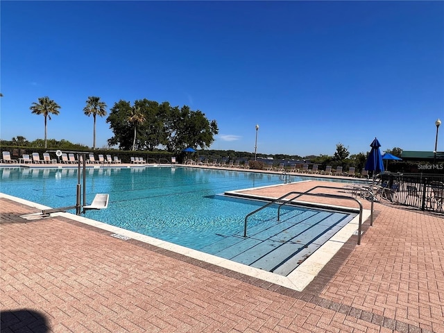 14936 Masthead Landing Cir, Winter Garden, FL 34787 - community pool featuring a patio