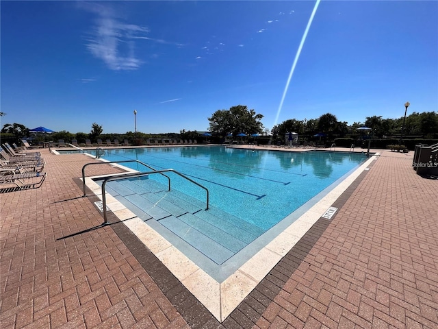 14936 Masthead Landing Cir, Winter Garden, FL 34787 - community pool featuring a patio