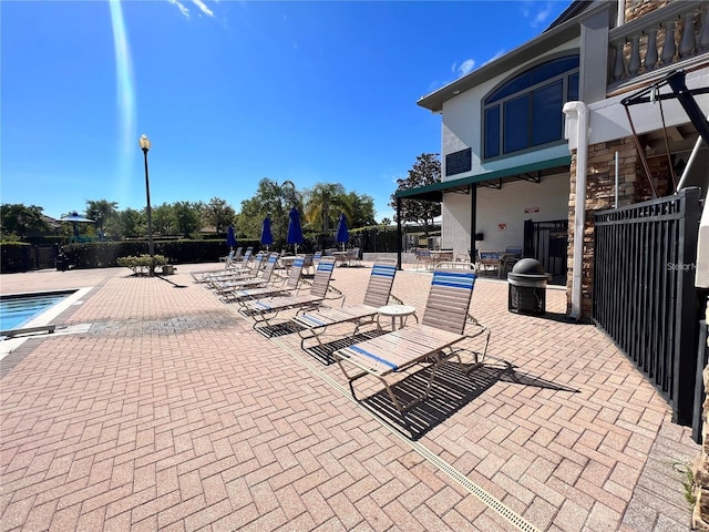 14936 Masthead Landing Cir, Winter Garden, FL 34787 - view of patio / terrace featuring a community pool