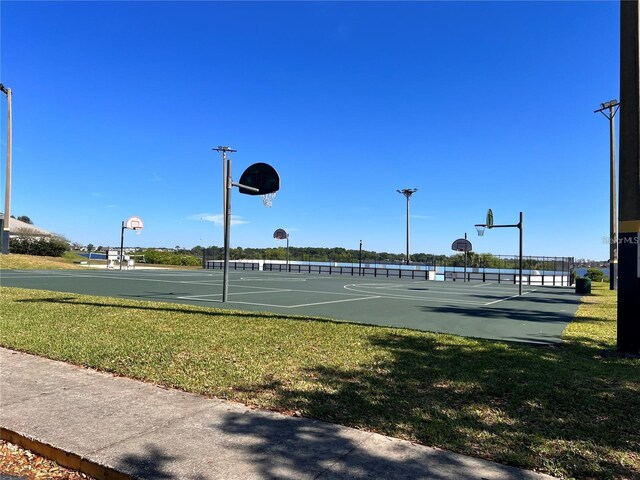 14936 Masthead Landing Cir, Winter Garden, FL 34787 - view of tennis court featuring community basketball court and a yard