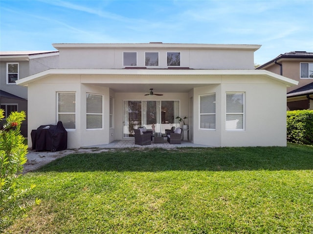 13156 Hatherton Cir, Orlando, FL 32832 - back of property with an outdoor hangout area, ceiling fan, stucco siding, a yard, and a patio area