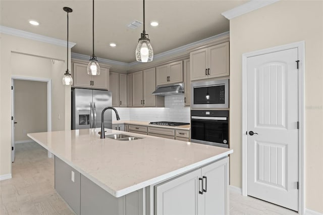 10245 Park Estates Ave, Orlando, FL 32836 - kitchen featuring appliances with stainless steel finishes, under cabinet range hood, a sink, gray cabinets, and tasteful backsplash